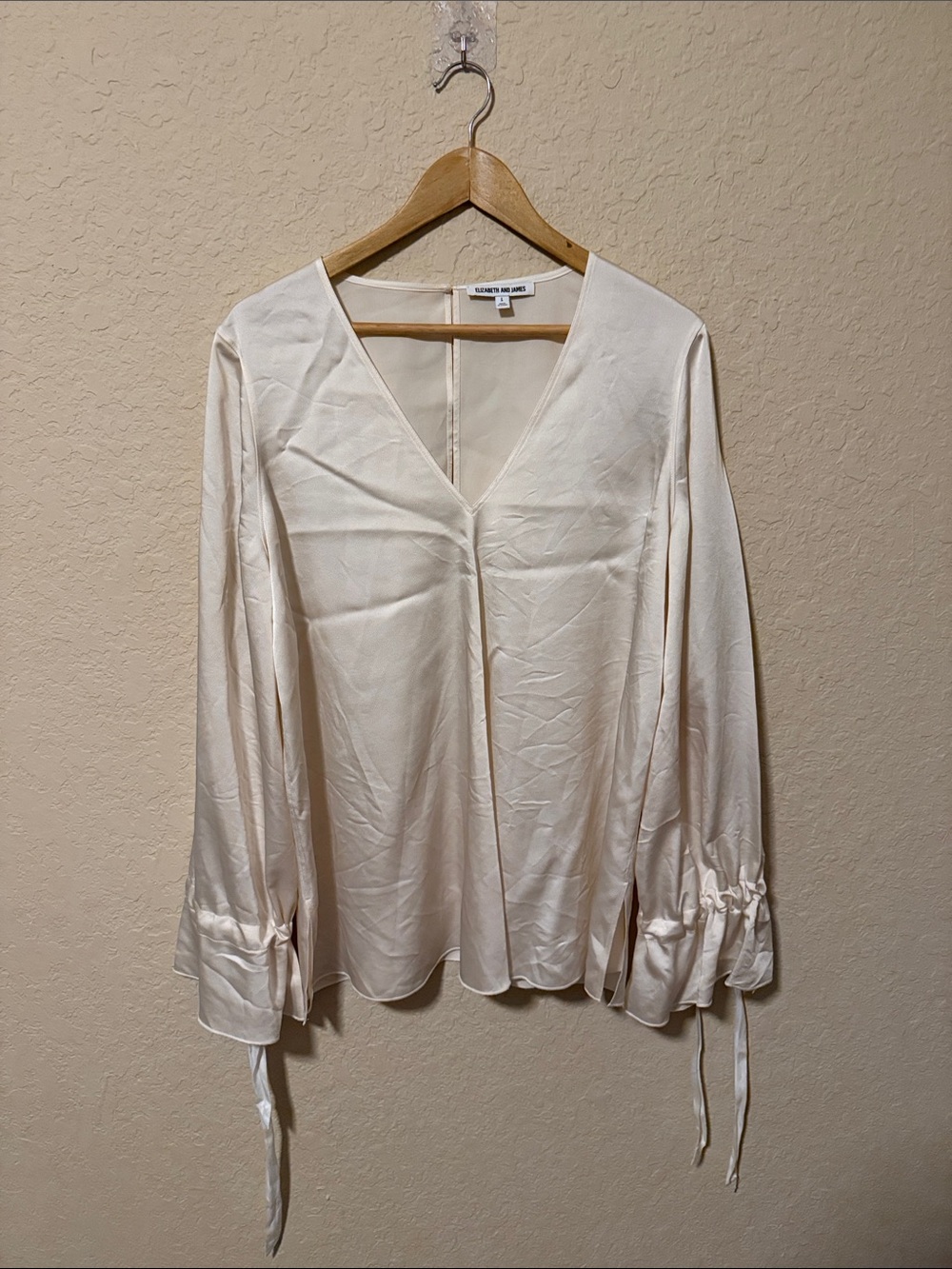 Elizabeth and James Cream Satin V-Neck Blouse with Tie Cuffs